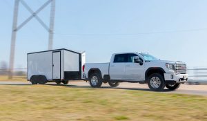truck pulling a cross trailer